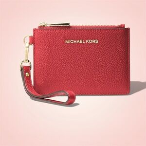 Michael Kors | Red Wristlet with pockets on the outside or inside